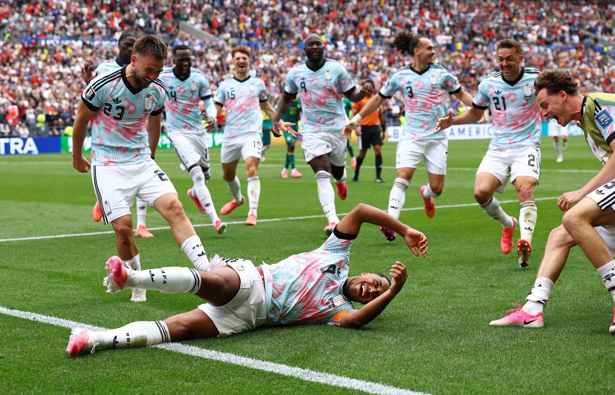 Tielemans scores late extra-time penalty to send Belgium into last 16
